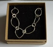 Organic shaped and hammered links sterling silver bracelet