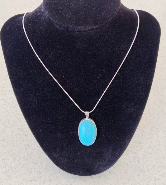 Turquoise set in Sterling Silver Pendant